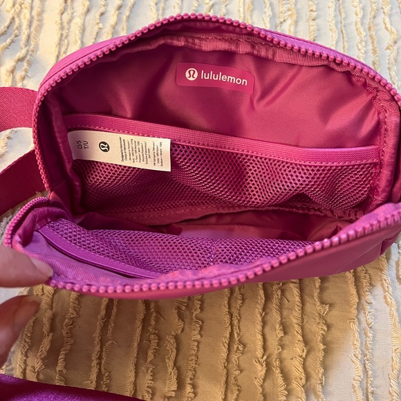 NWT Authentic Lululemon everywhere belt bag , color is  a hot pink or fuschia . - Picture 3 of 4